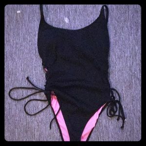black one piece swimsuit. No tag, but never worn